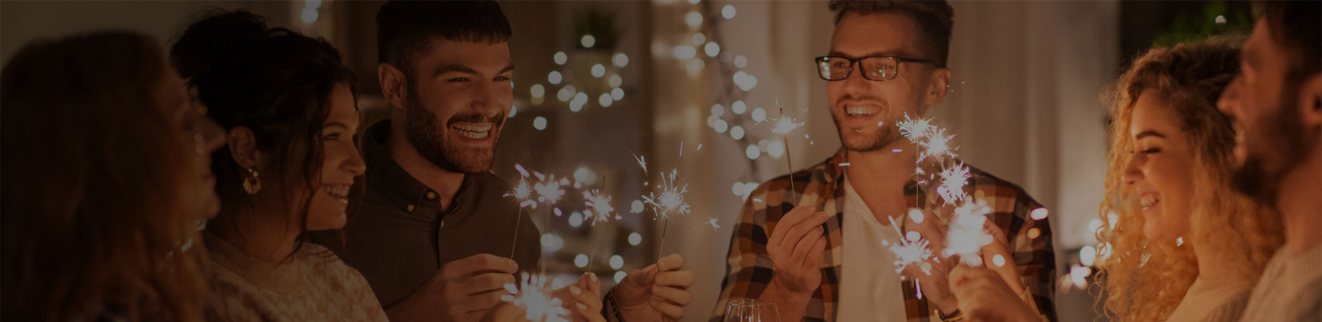 Friends celebrating with sparklers