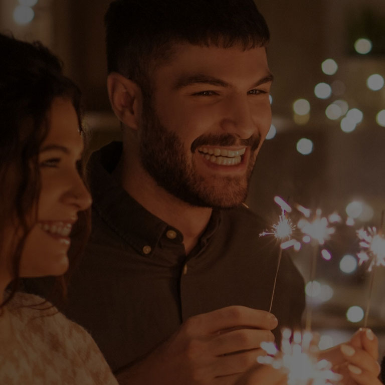 Friends celebrating with sparklers