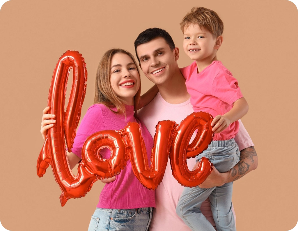 Young family with love balloons