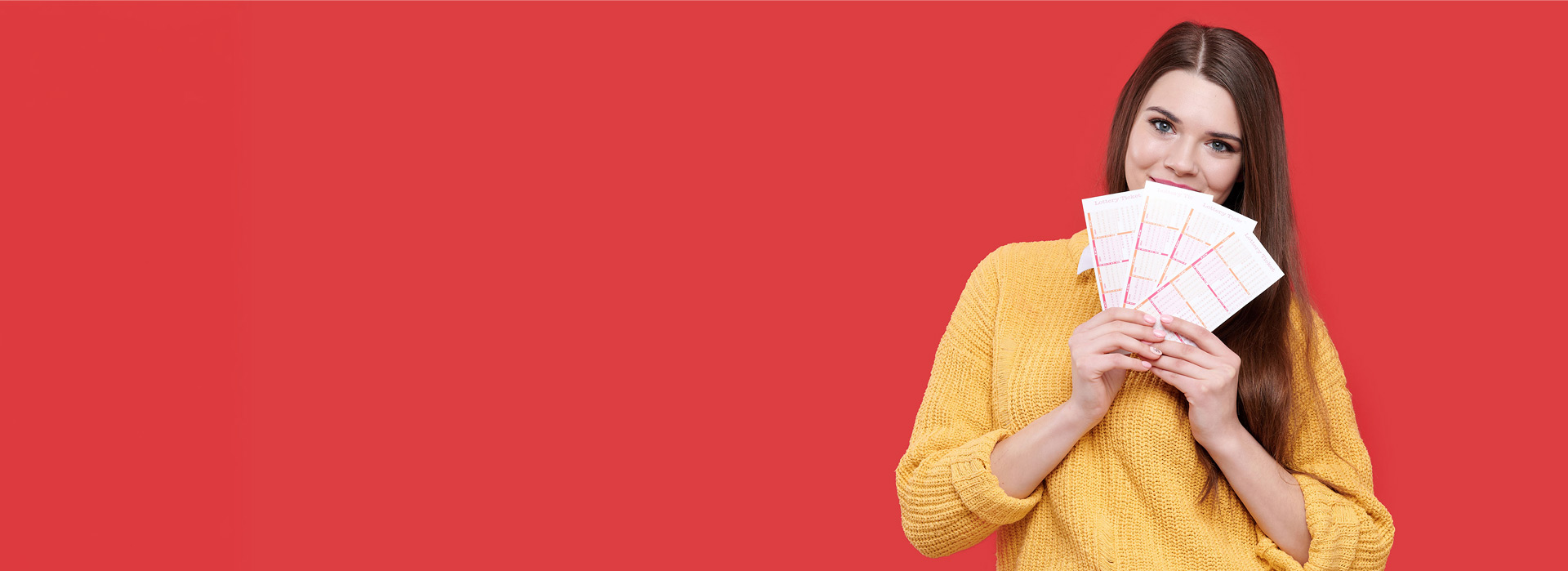 Woman holding bingo cards